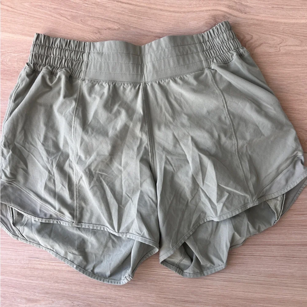 SOLD. Lululemon Olive Green Hotty Hot Shorts - Picture 1 of 4